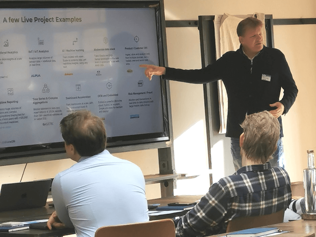 Steve van den Berg from CrateDB explaining live project examples from CrateDB at European City Tour Amsterdam 2025